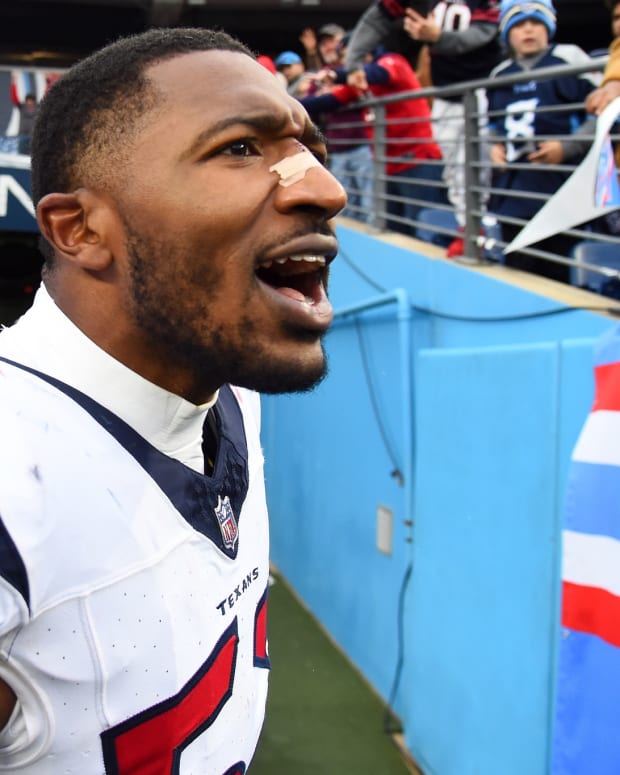 Dec 17, 2023; Nashville, Tennessee, USA; Houston Texans defensive end Jonathan Greenard (52) celebrates after a victory against the Tennessee Titans at Nissan Stadium.